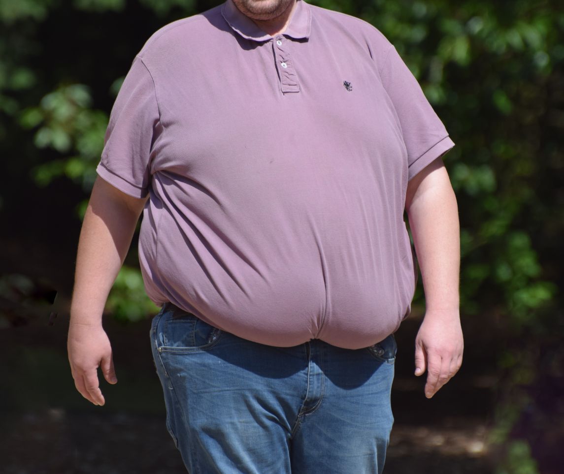 Wiltshire, UK May 12 2019. A morbidly obese man with a large stomach of abdominal fat UK obesity & unhealthy lifestyles continue to take their toll as experts link increased Covid-19 deaths to obesity