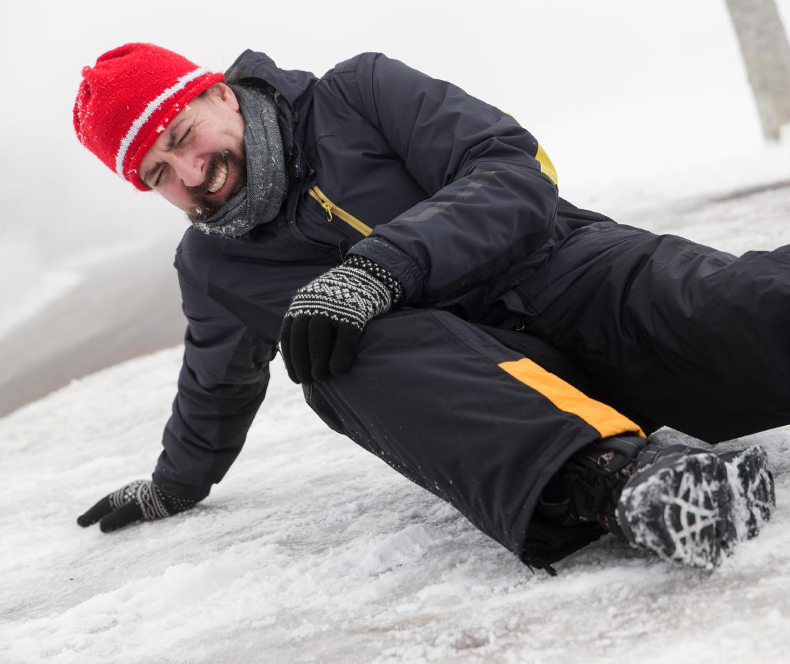 Man has an accident on a icy Street