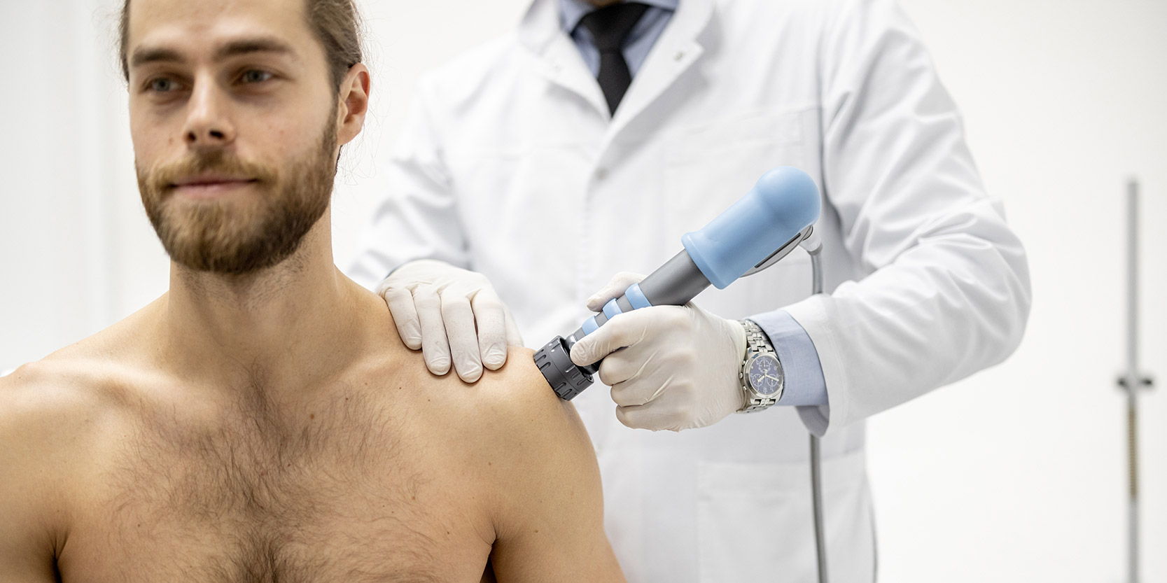 a man getting his shoulder treated