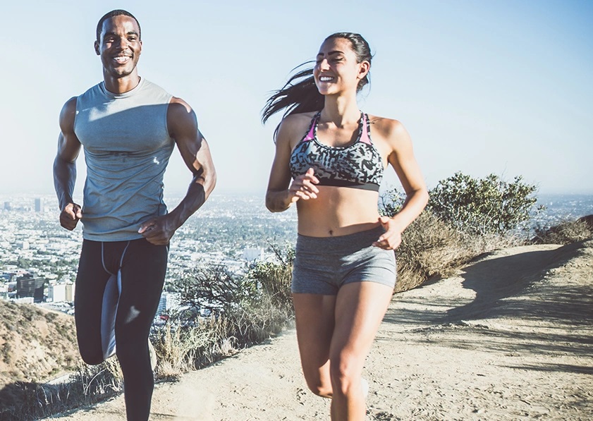 a man and a woman jogging