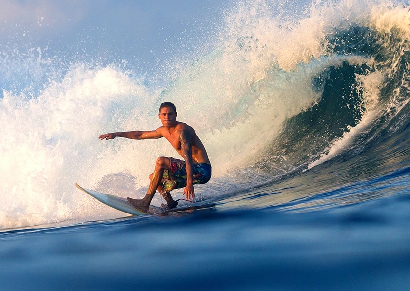 man surfing in the seawater