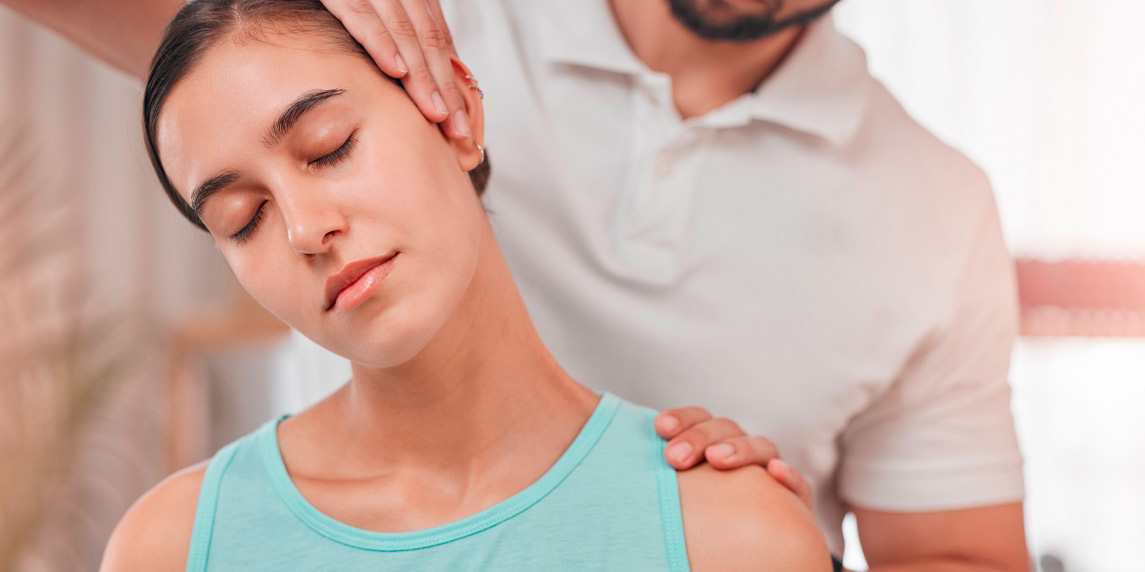 Physiotherapy, neck pain and stretching with woman and doctor for healthcare, chiropractic or consulting. Massage, wellness or medical with man and patient exam for rehabilitation, healing or therapy