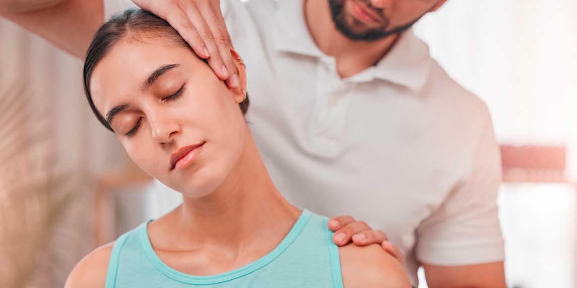 Physiotherapy, neck pain and stretching with woman and doctor for healthcare, chiropractic or consulting. Massage, wellness or medical with man and patient exam for rehabilitation, healing or therapy